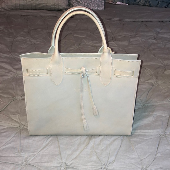 Dooney & Bourke Handbags - Dooney & Bourke Alto tassel in Sky Blue